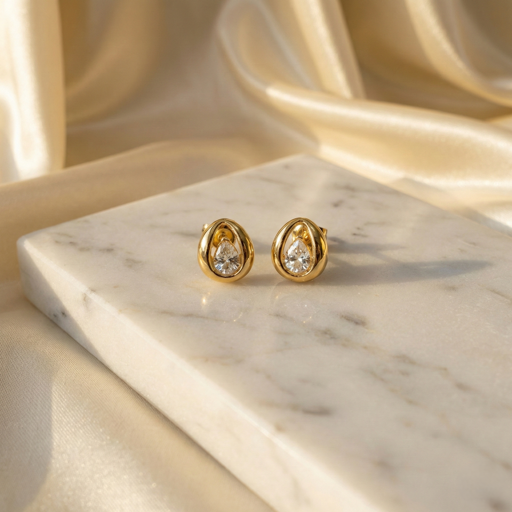 Gold Pear Shape Zirconia Stud Earring