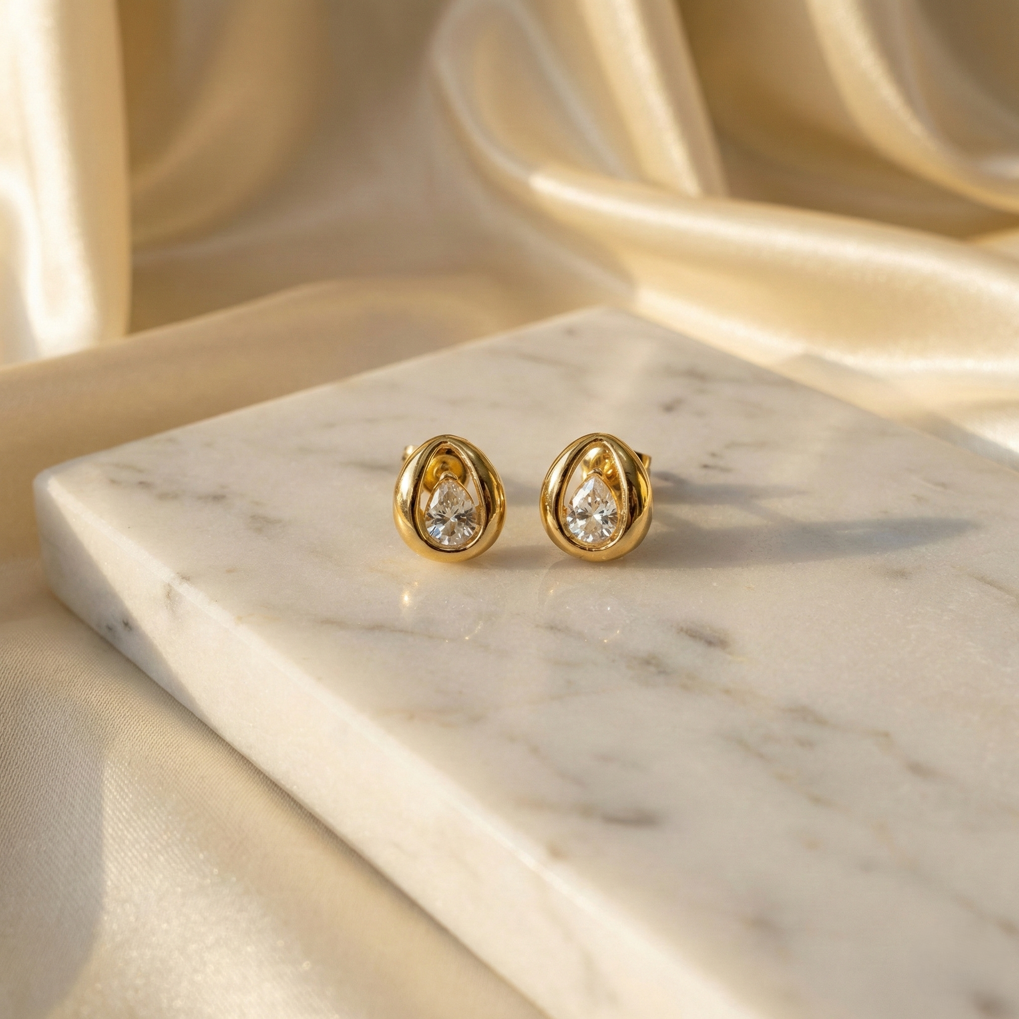 Gold Pear Shape Zirconia Stud Earring