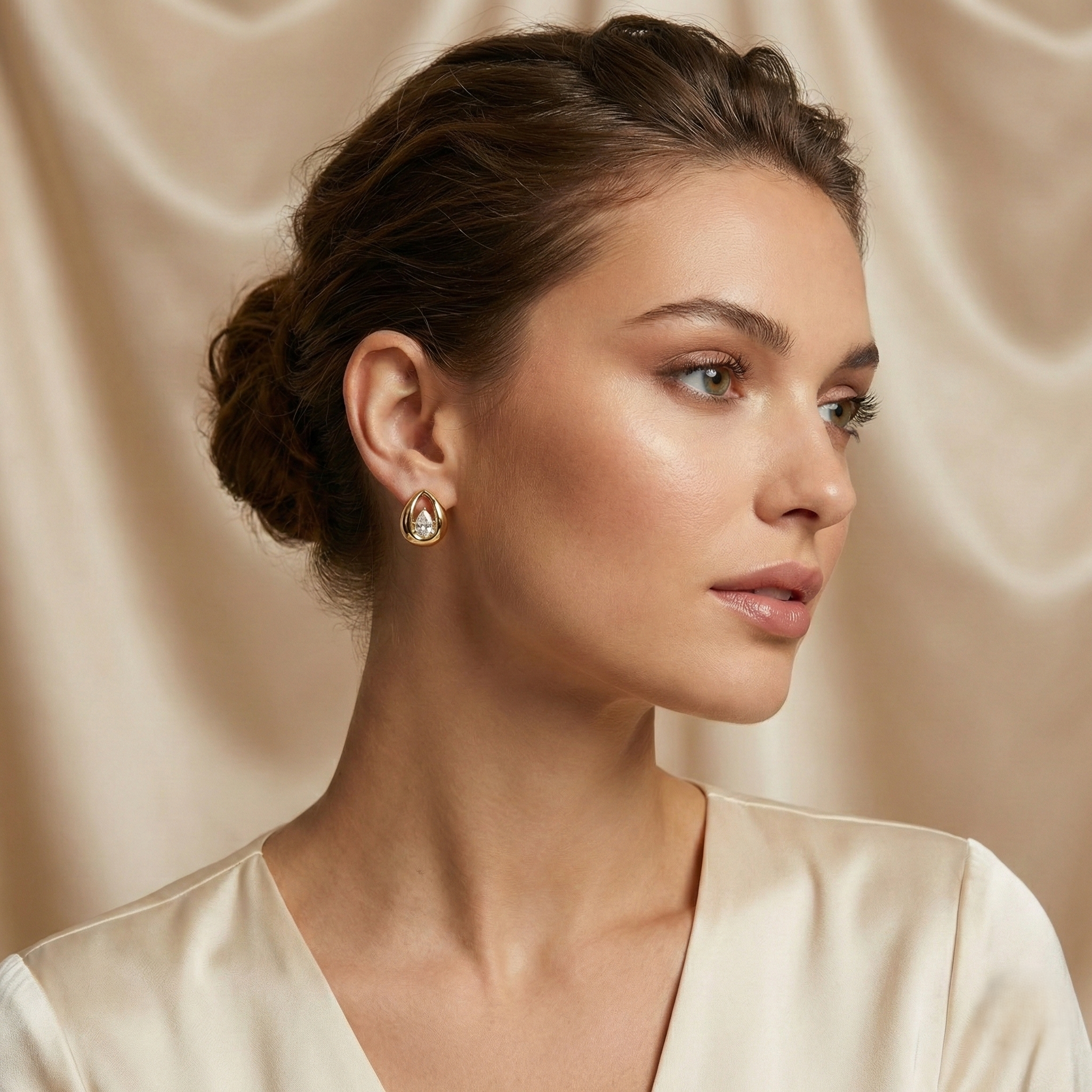 Gold Pear Shape Zirconia Stud Earring