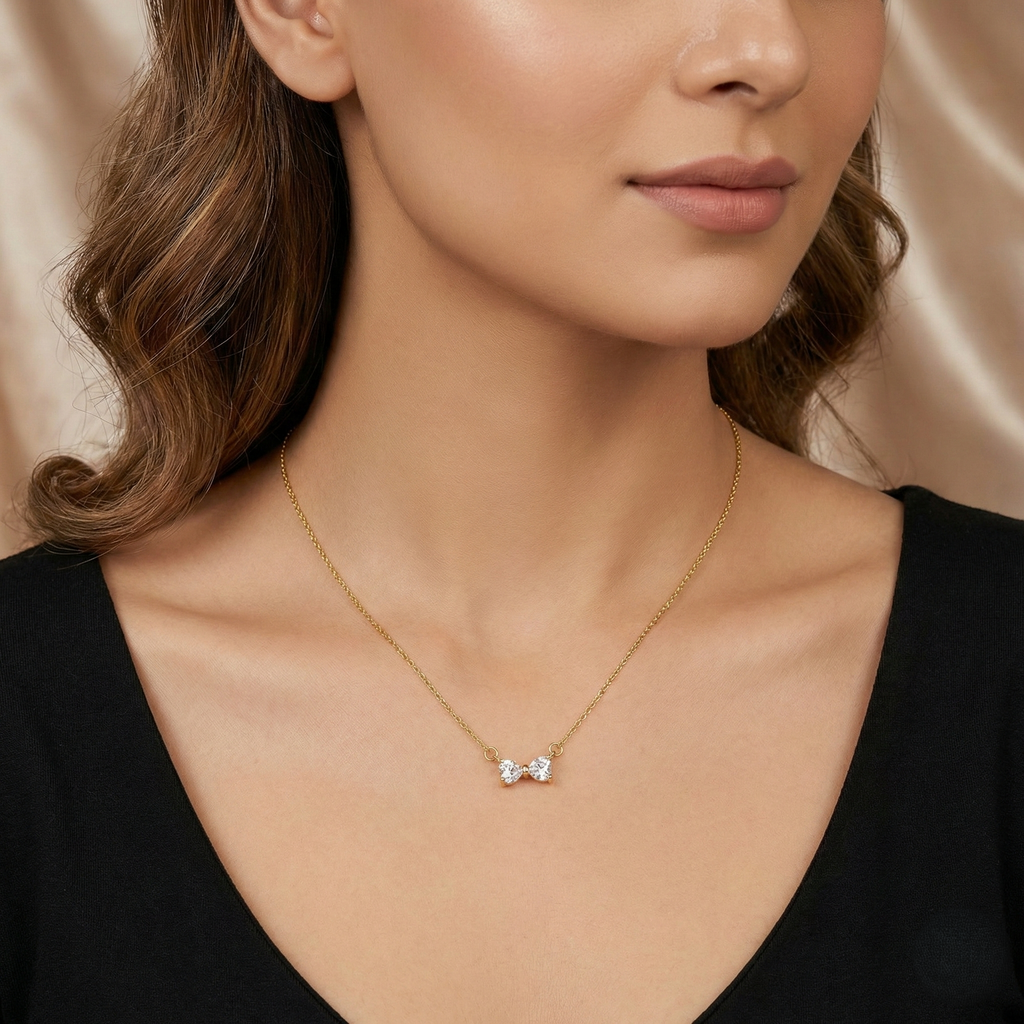 Sparkling Crystal Bow Necklace in Gold