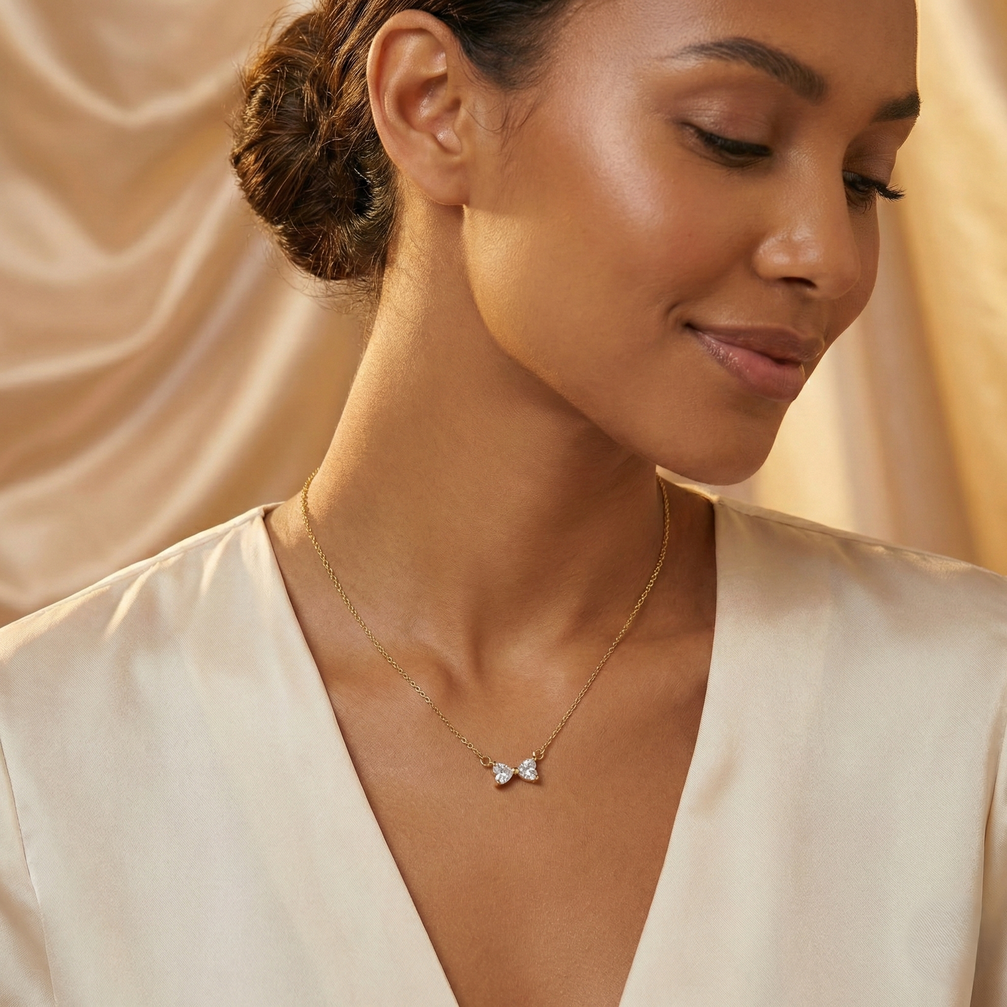 Sparkling Crystal Bow Necklace in Gold